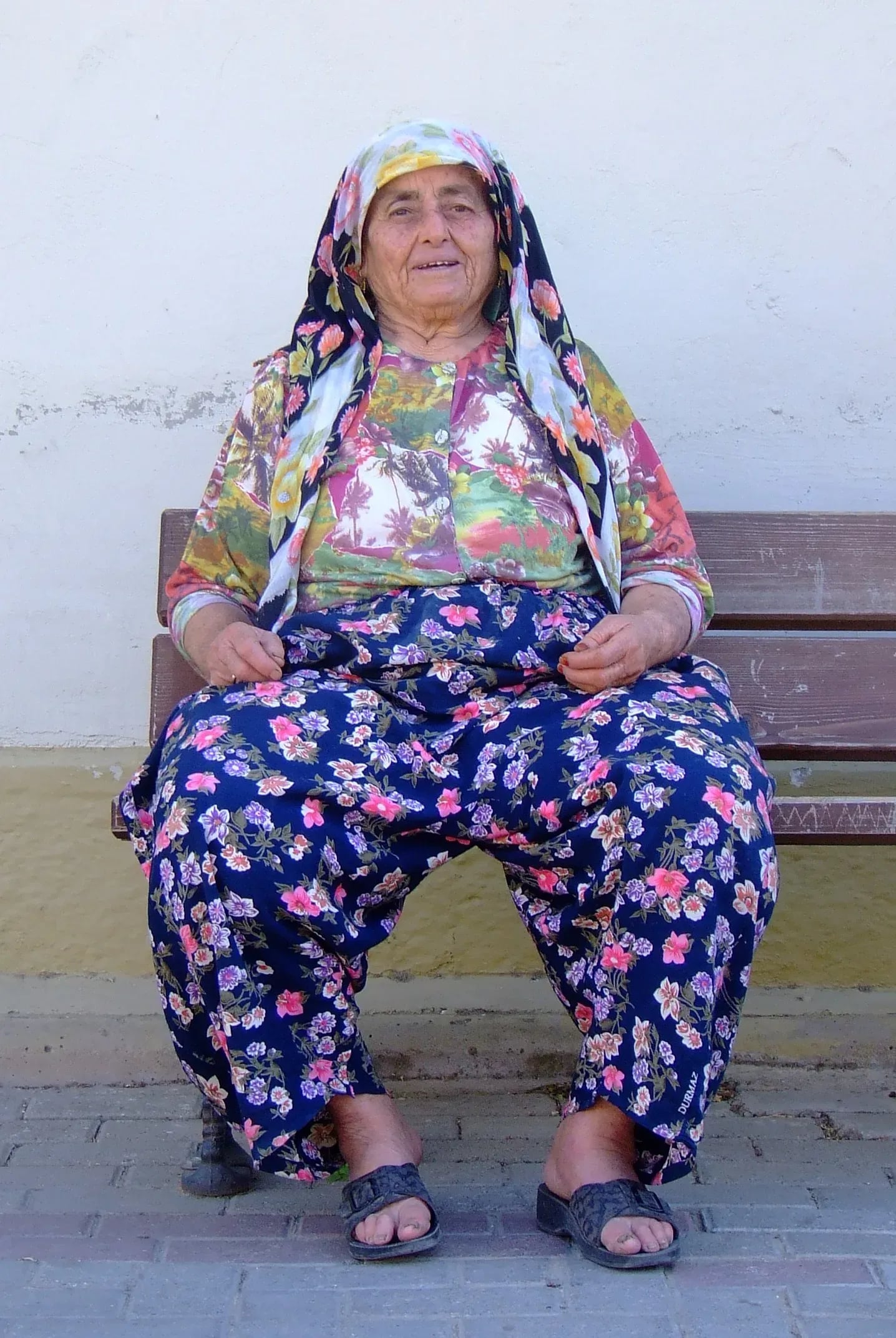 Selçuk; elderly woman in Selçuk, Turkey, wearing traditional Turkish dress